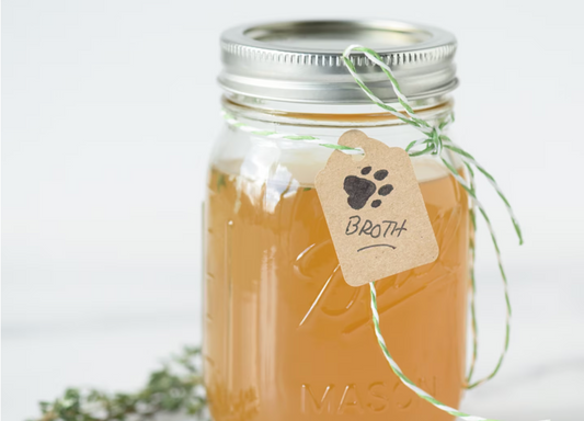 Mason jar filled with bone broth with tag that says "Broth" on it