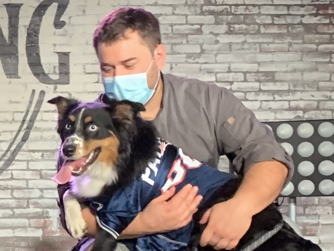 Chef Ryan Kotwica holding dog