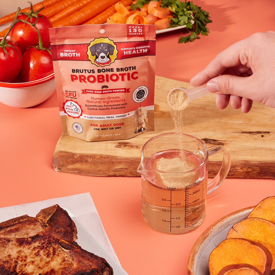 Pouring Brutus Bone Broth Probiotic Pork Bone Broth Powder in 8 ounces of water