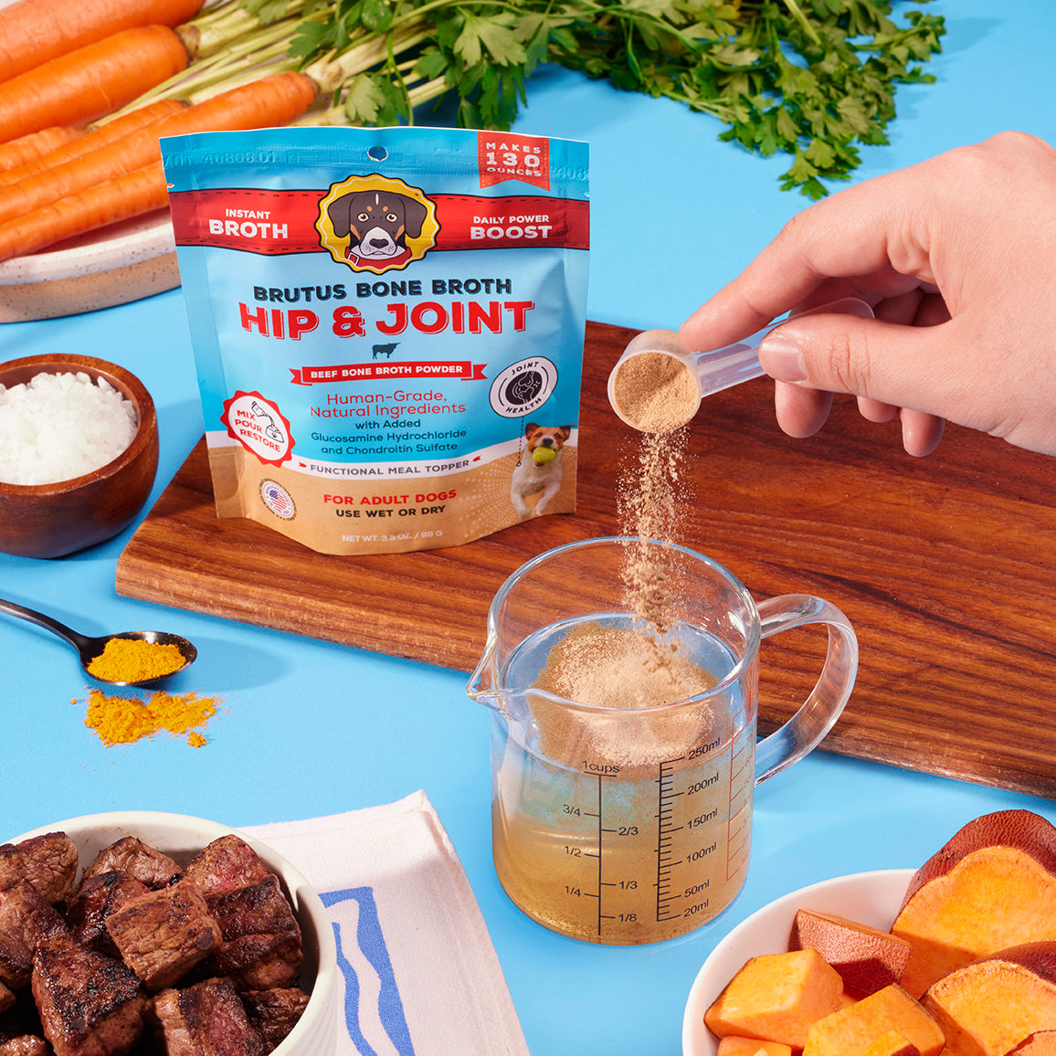 Pouring Brutus Bone Broth Hip & Joint Beef Bone Broth Powder into 8 ounces of water