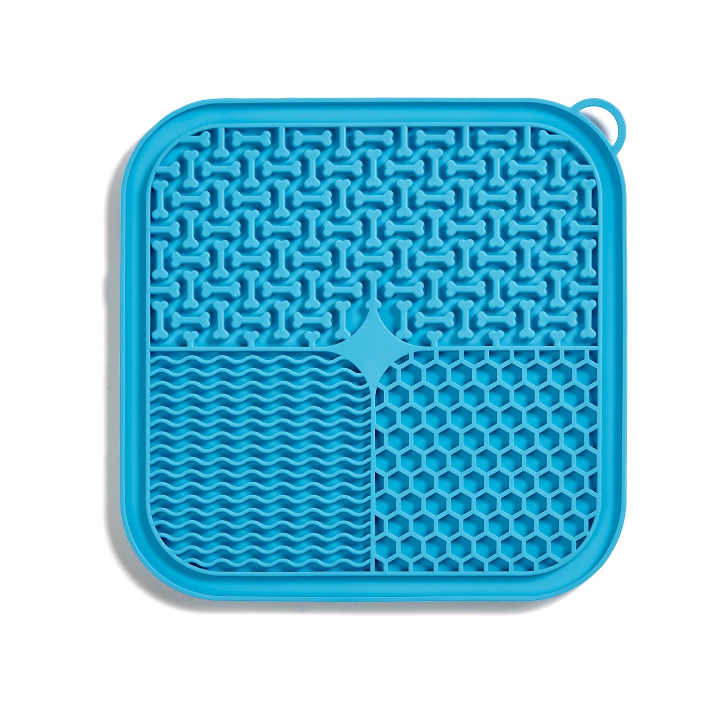 Blue lick mat with bones, waves, and honeycomb patterns