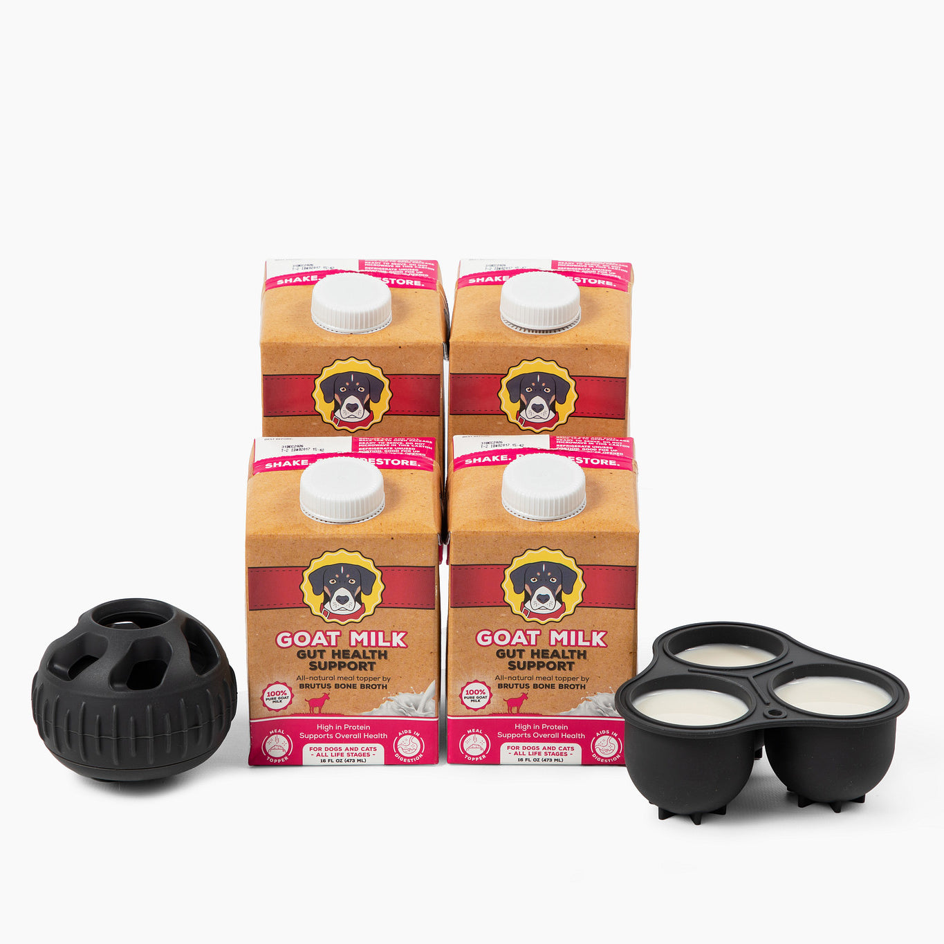 Front view of Goat Milk Club for Dogs: four cartons with black silicone ball and three-cup treat tray on white background
