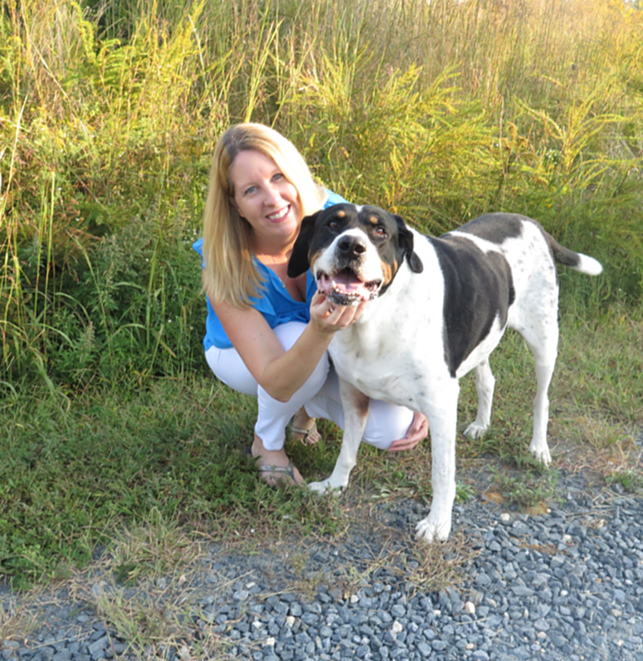 Co-founder Sue Delegan with her dog Brutus